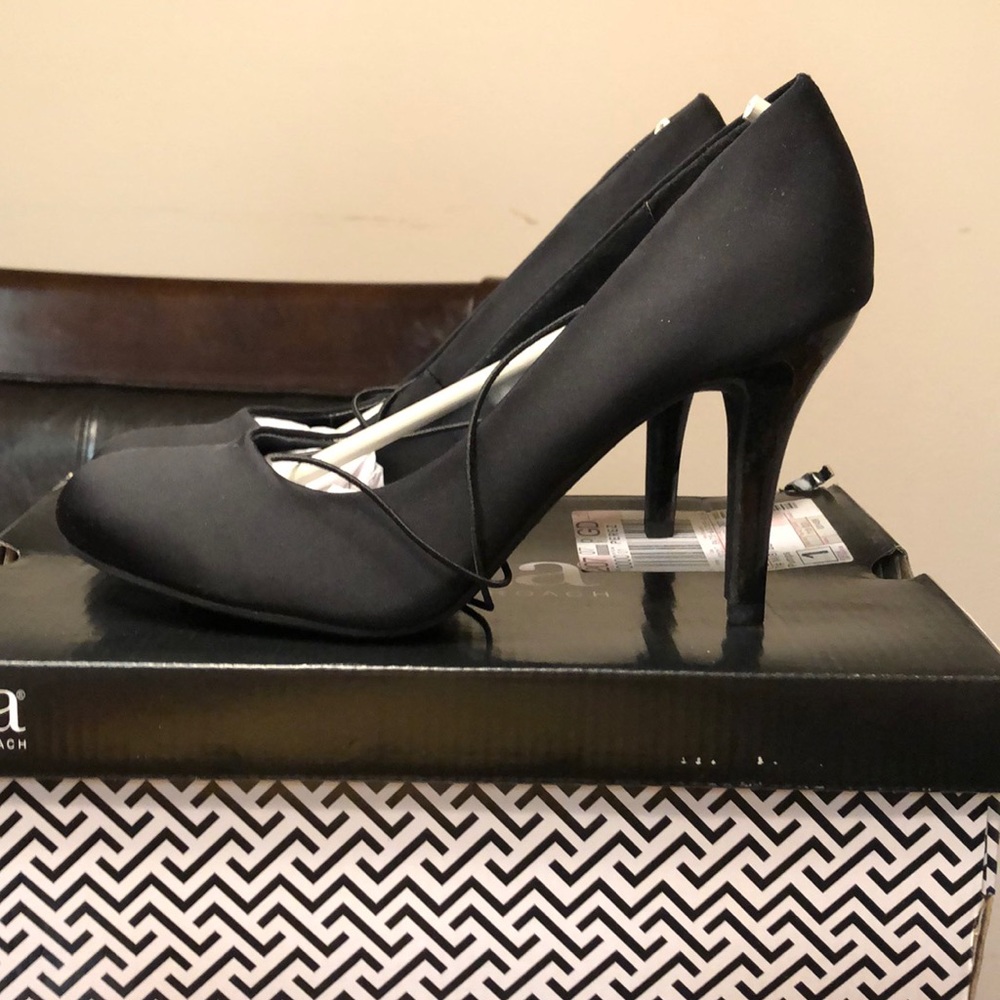 Black satin rounded toe pumps